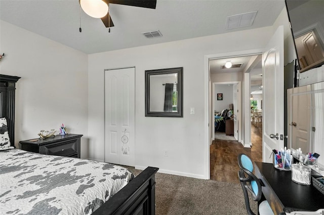 7 Grand Par Ct, Bunnell, FL 32110 - bedroom with a closet, dark carpet, and a ceiling fan