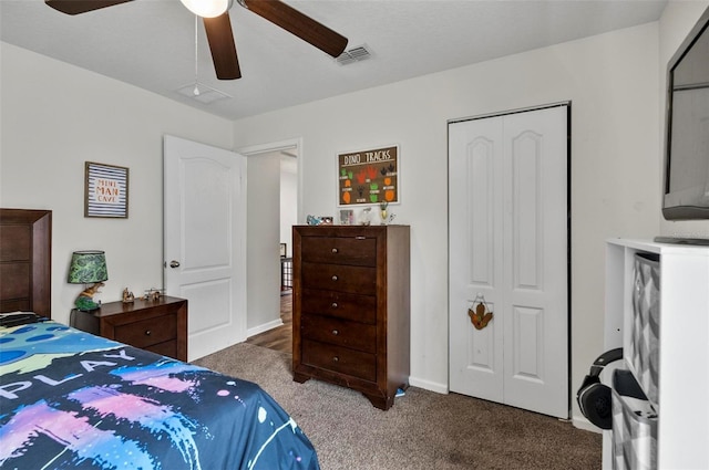 7 Grand Par Ct, Bunnell, FL 32110 - carpeted bedroom with a closet and a ceiling fan