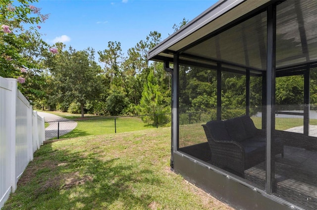 7 Grand Par Ct, Bunnell, FL 32110 - fenced backyard with an outdoor hangout area and view of scattered trees