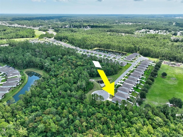 7 Grand Par Ct, Bunnell, FL 32110 - aerial view of property's location featuring a large body of water and nearby suburban area