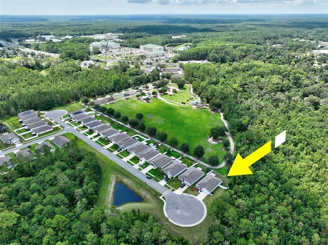 7 Grand Par Ct, Bunnell, FL 32110 - view of property location featuring a forest and a nearby body of water