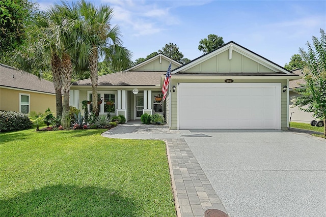 166 Midway Park Dr, Saint Augustine, FL 32084 - ranch-style home with board and batten siding, concrete driveway, an attached garage, and a front lawn
