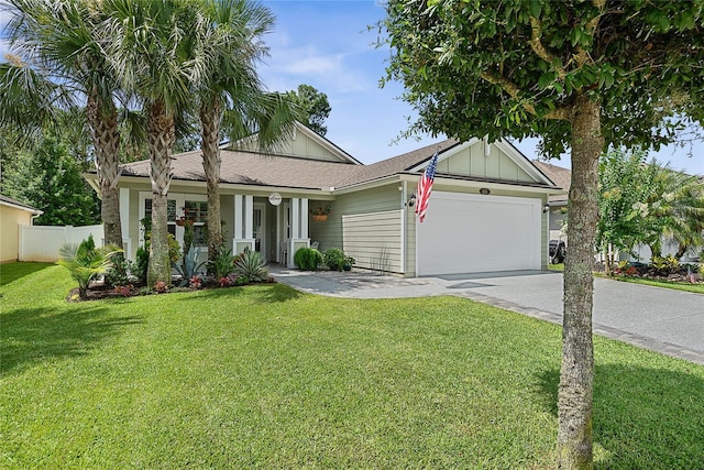 166 Midway Park Dr, Saint Augustine, FL 32084 - view of front facade featuring a garage, driveway, and board and batten siding