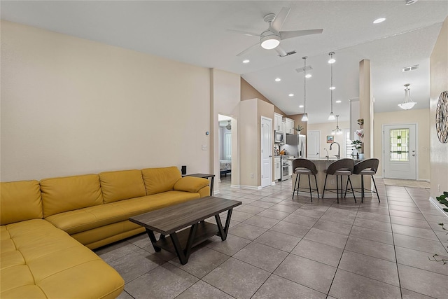 166 Midway Park Dr, Saint Augustine, FL 32084 - living area with ceiling fan, lofted ceiling, light tile patterned floors, and recessed lighting