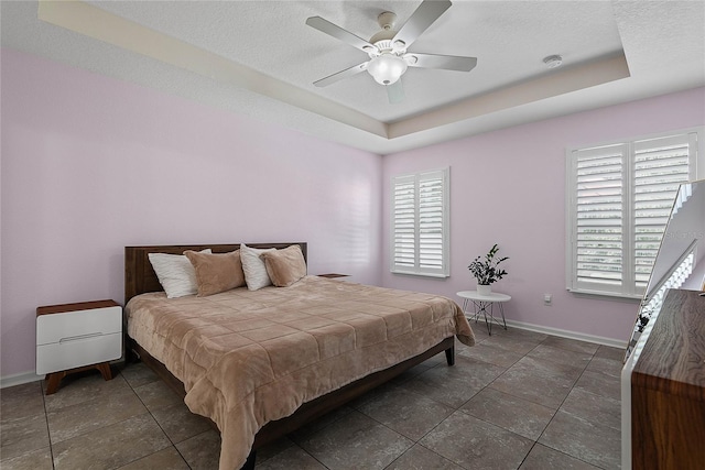 166 Midway Park Dr, Saint Augustine, FL 32084 - bedroom with a raised ceiling and a ceiling fan