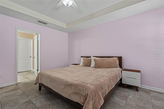 166 Midway Park Dr, Saint Augustine, FL 32084 - tiled bedroom with baseboards and a ceiling fan