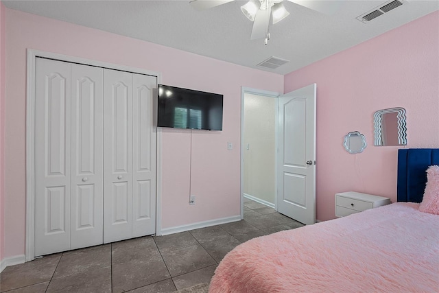 166 Midway Park Dr, Saint Augustine, FL 32084 - bedroom featuring tile patterned flooring, a closet, and a ceiling fan