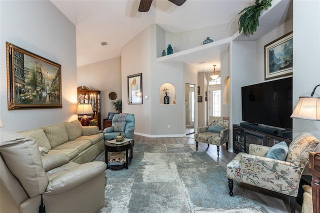 25 Raintree Cir, Palm Coast, FL 32164 - living area with wood finished floors, high vaulted ceiling, and a ceiling fan