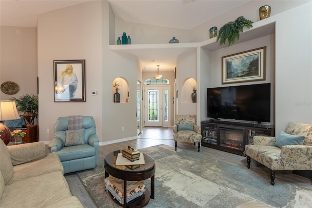 25 Raintree Cir, Palm Coast, FL 32164 - living area with wood finished floors and lofted ceiling