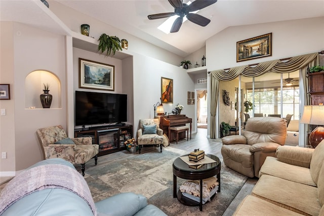 25 Raintree Cir, Palm Coast, FL 32164 - living room with vaulted ceiling, ceiling fan, and wood finished floors