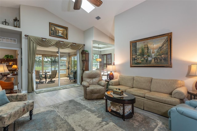 25 Raintree Cir, Palm Coast, FL 32164 - living area with ceiling fan, wood finished floors, and high vaulted ceiling