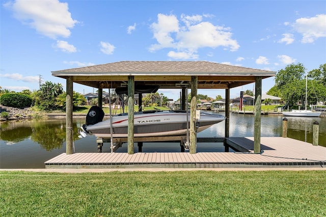 4 Old Oak Dr N, Palm Coast, FL 32137 - dock featuring boat lift, a water view, and a yard