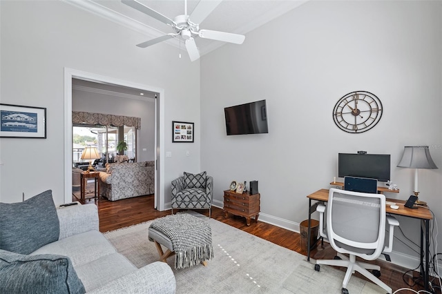 4 Old Oak Dr N, Palm Coast, FL 32137 - office featuring wood finished floors, crown molding, ceiling fan, and a high ceiling