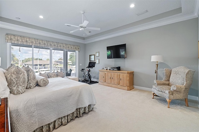 4 Old Oak Dr N, Palm Coast, FL 32137 - carpeted bedroom featuring a tray ceiling, ornamental molding, recessed lighting, access to exterior, and ceiling fan