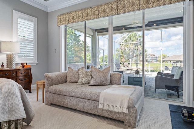 4 Old Oak Dr N, Palm Coast, FL 32137 - bedroom with access to outside, a sunroom, ornamental molding, and carpet flooring