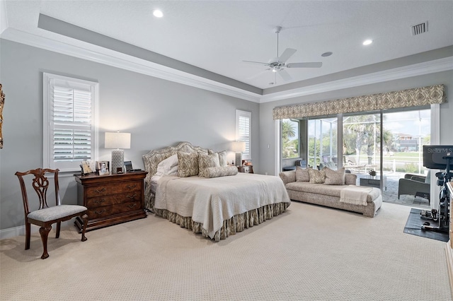 4 Old Oak Dr N, Palm Coast, FL 32137 - bedroom featuring carpet flooring, access to exterior, a tray ceiling, crown molding, and recessed lighting