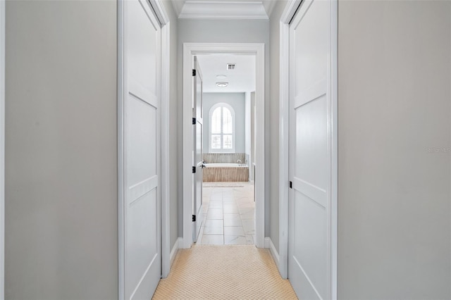 4 Old Oak Dr N, Palm Coast, FL 32137 - hall featuring crown molding and light tile patterned floors