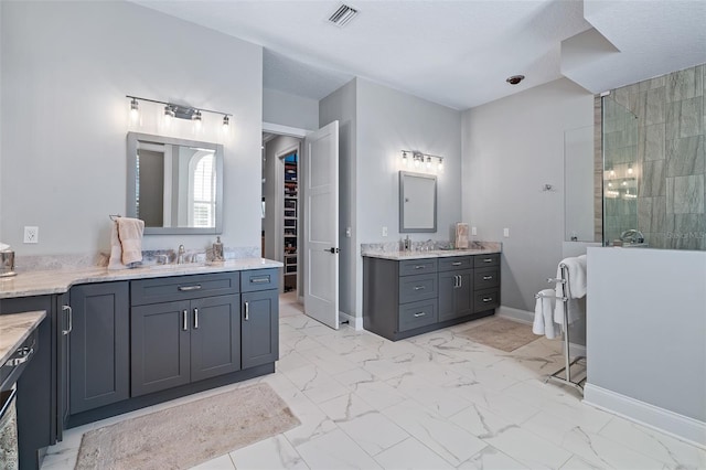 4 Old Oak Dr N, Palm Coast, FL 32137 - bathroom with tiled shower, two vanities, and marble look tiles