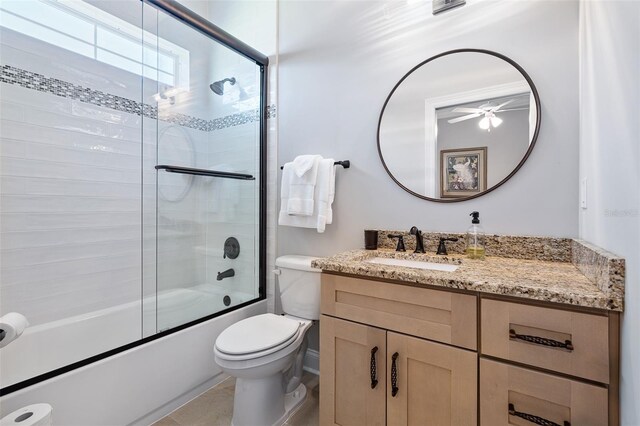 4 Old Oak Dr N, Palm Coast, FL 32137 - bathroom featuring vanity, combined bath / shower with glass door, and a ceiling fan