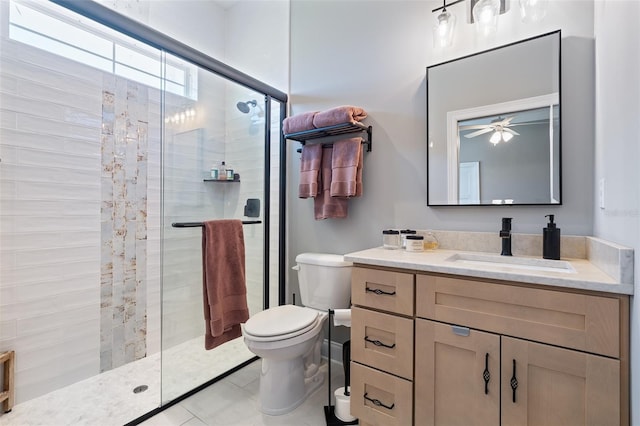 4 Old Oak Dr N, Palm Coast, FL 32137 - bathroom with a stall shower, vanity, a ceiling fan, and tile patterned flooring