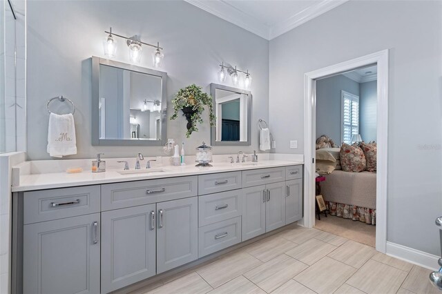 4 Old Oak Dr N, Palm Coast, FL 32137 - full bathroom featuring double vanity, ornamental molding, and ensuite bathroom