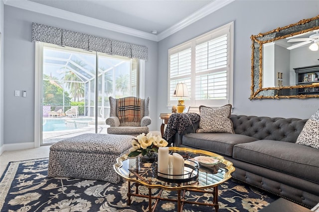 4 Old Oak Dr N, Palm Coast, FL 32137 - living area with ornamental molding, carpet flooring, and ceiling fan
