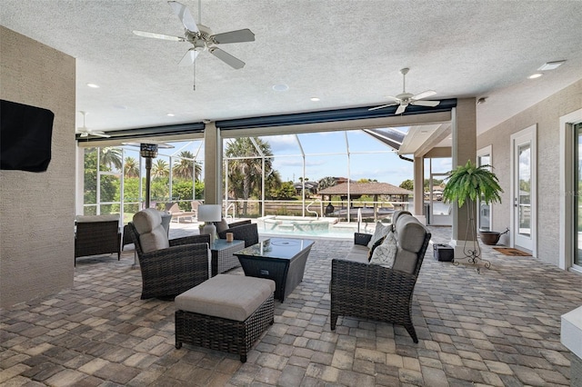 4 Old Oak Dr N, Palm Coast, FL 32137 - view of patio / terrace with a ceiling fan, an outdoor hangout area, a lanai, and a pool with connected hot tub