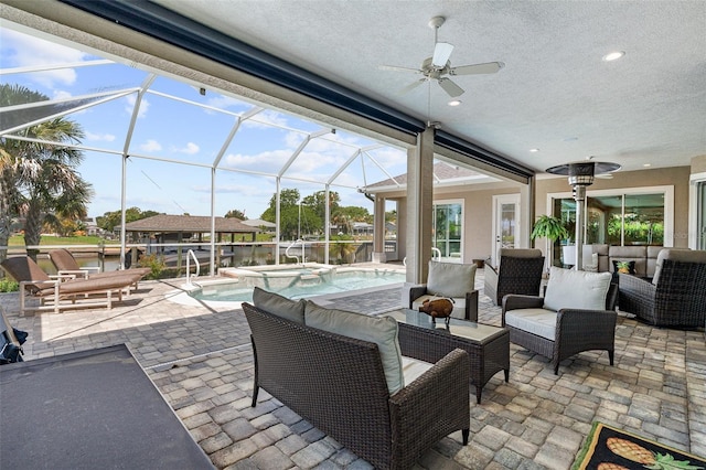 4 Old Oak Dr N, Palm Coast, FL 32137 - view of patio / terrace featuring ceiling fan, an outdoor living space, a pool with connected hot tub, and glass enclosure