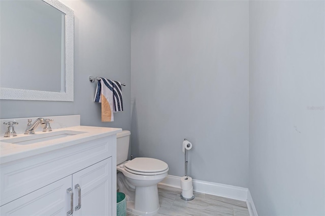 4 Old Oak Dr N, Palm Coast, FL 32137 - bathroom featuring baseboards and vanity