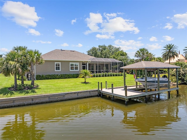 4 Old Oak Dr N, Palm Coast, FL 32137 - dock area featuring boat lift, a water view, and a yard