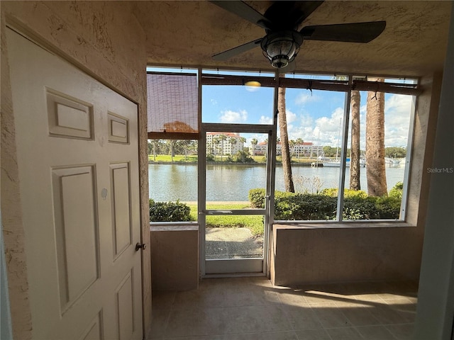 59 Rivers Edge Ln Unit 59, Palm Coast, FL 32137 - unfurnished sunroom with a water view and plenty of natural light