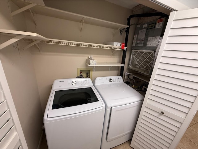 59 Rivers Edge Ln Unit 59, Palm Coast, FL 32137 - laundry room with washer and clothes dryer