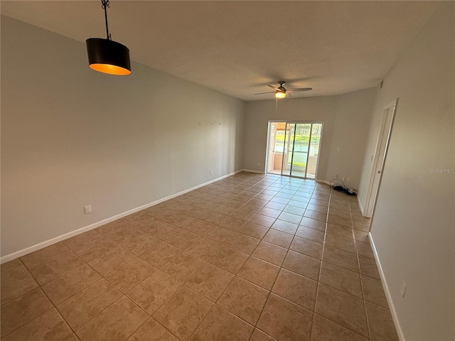 59 Rivers Edge Ln Unit 59, Palm Coast, FL 32137 - empty room with ceiling fan and light tile patterned floors