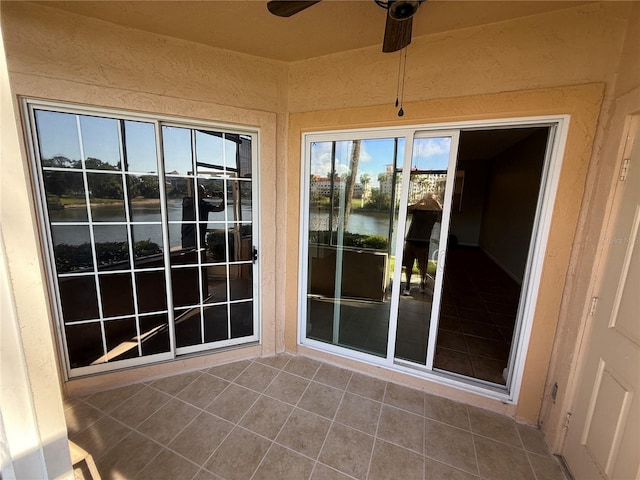 59 Rivers Edge Ln Unit 59, Palm Coast, FL 32137 - unfurnished sunroom featuring a water view