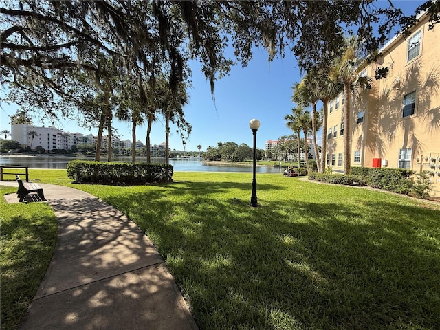 59 Rivers Edge Ln Unit 59, Palm Coast, FL 32137 - surrounding community with a yard and a water view