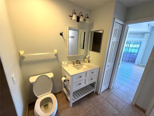 59 Rivers Edge Ln Unit 59, Palm Coast, FL 32137 - bathroom with vanity and tile patterned floors