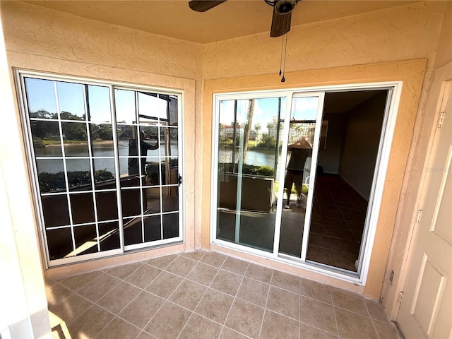 59 Rivers Edge Ln Unit 59, Palm Coast, FL 32137 - unfurnished sunroom featuring a water view