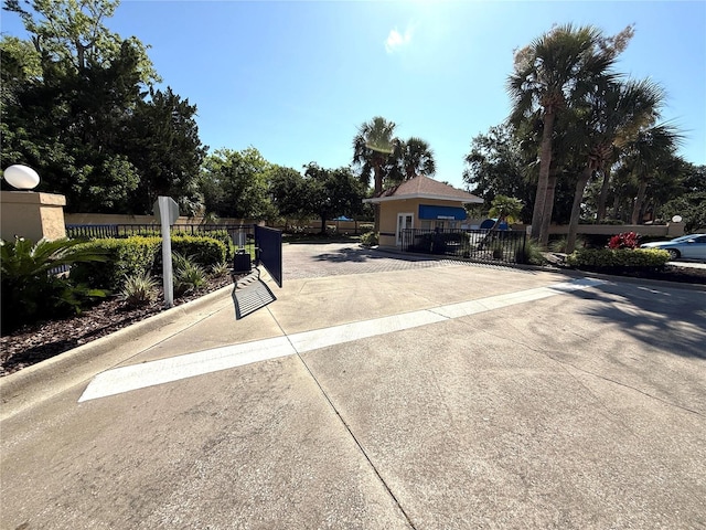 59 Rivers Edge Ln Unit 59, Palm Coast, FL 32137 - view of property's community with a gate and driveway
