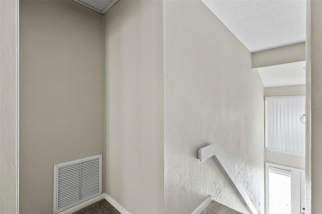 14 Oakmont Ct Unit 14, Palm Coast, FL 32137 - stairs featuring baseboards and carpet