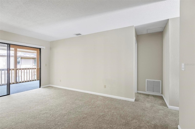 14 Oakmont Ct Unit 14, Palm Coast, FL 32137 - spare room featuring carpet and baseboards