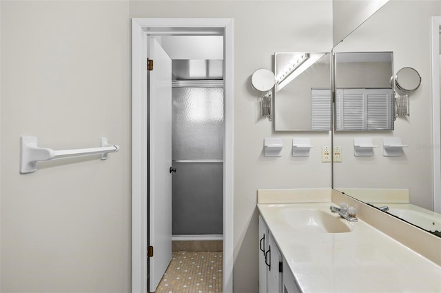 14 Oakmont Ct Unit 14, Palm Coast, FL 32137 - bathroom with vanity and a shower with shower door