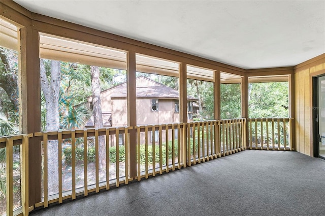 14 Oakmont Ct Unit 14, Palm Coast, FL 32137 - unfurnished sunroom with carpet