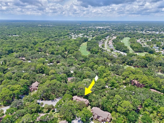 14 Oakmont Ct Unit 14, Palm Coast, FL 32137 - aerial view of property and surrounding area with a heavily wooded area