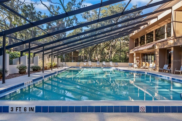 14 Oakmont Ct Unit 14, Palm Coast, FL 32137 - community pool featuring a lanai and a patio