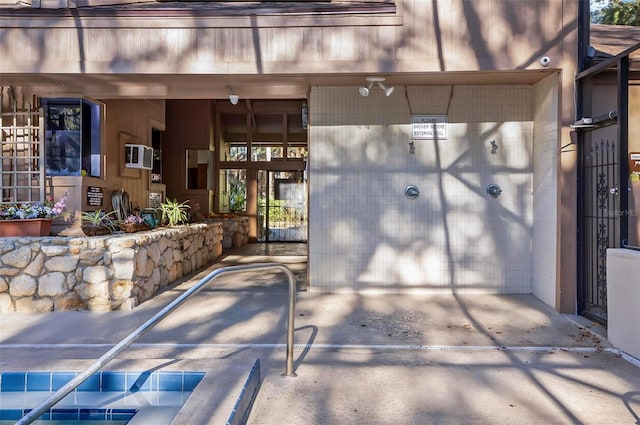 14 Oakmont Ct Unit 14, Palm Coast, FL 32137 - entrance to property with a surveillance system