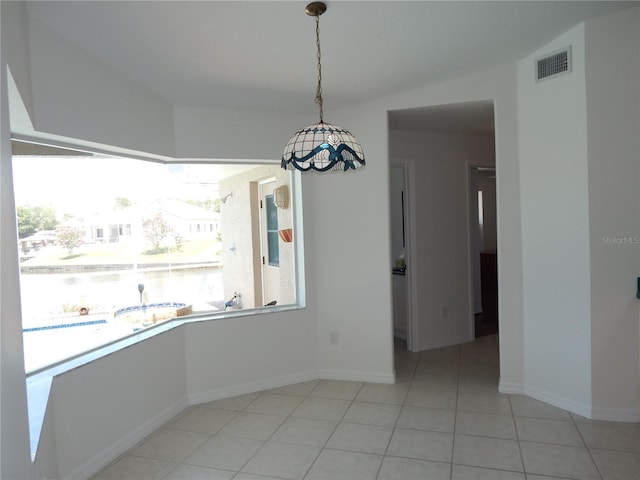 7 College Ct, Palm Coast, FL 32137 - unfurnished dining area featuring light tile patterned flooring and baseboards