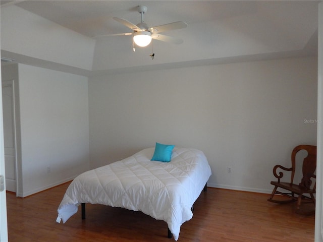 7 College Ct, Palm Coast, FL 32137 - bedroom with wood finished floors and a ceiling fan