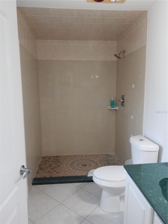 7 College Ct, Palm Coast, FL 32137 - bathroom with a stall shower, vanity, and tile patterned flooring