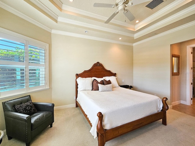 145 Heron Dr, Palm Coast, FL 32137 - bedroom with a raised ceiling, light carpet, ornamental molding, a ceiling fan, and recessed lighting