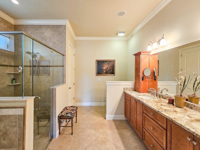 145 Heron Dr, Palm Coast, FL 32137 - bathroom featuring double vanity, a stall shower, crown molding, tile patterned flooring, and recessed lighting